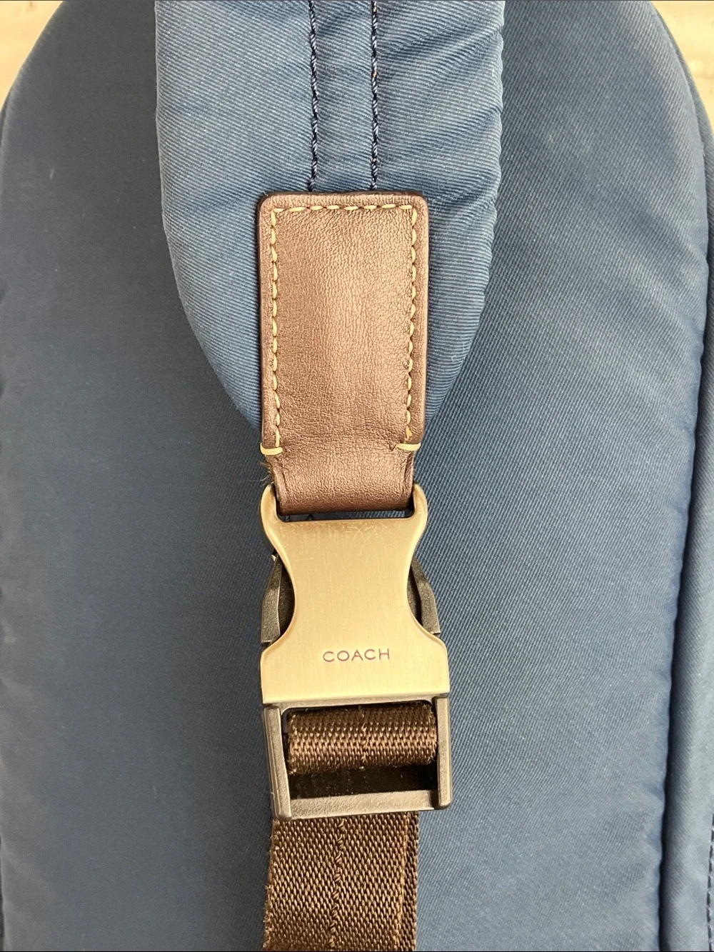 COACH Varick sling bag in navy blue / gray nylon with brown leather trim